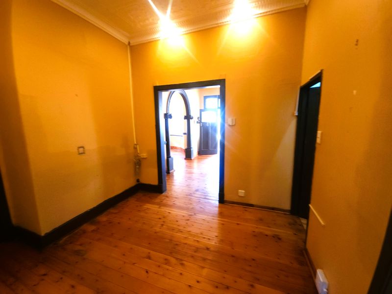 Versatile Kensington Gem: A Classic Family Home with Income-Generating Potential - Photo 5