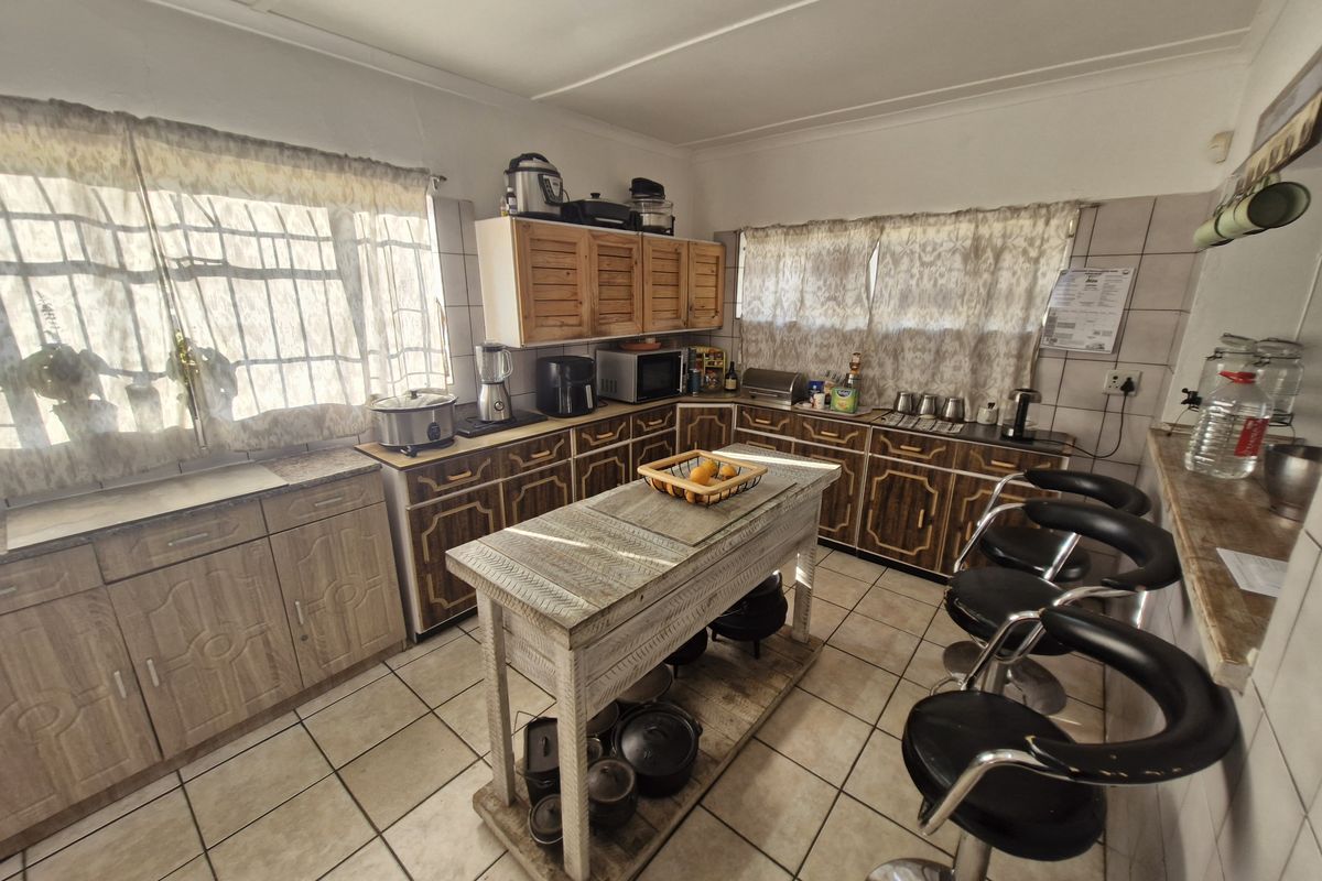 Spacious Family Home with Practical Living Spaces and Endless Potential - Photo 2