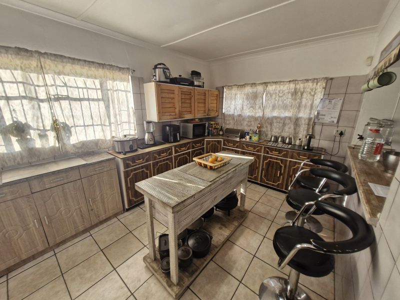 Spacious Family Home with Practical Living Spaces and Endless Potential - Photo 2
