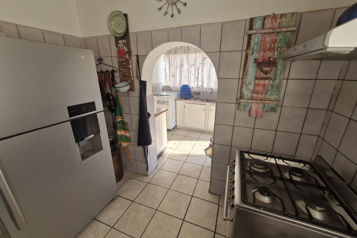 Spacious Family Home with Practical Living Spaces and Endless Potential - Photo 3