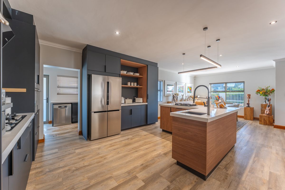 Immaculate Fully Furnished Coastal Home in an Exclusive Canal Area Location - Photo 3