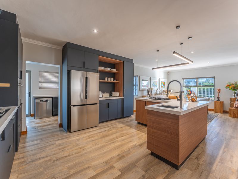 Immaculate Fully Furnished Coastal Home in an Exclusive Canal Area Location - Photo 3