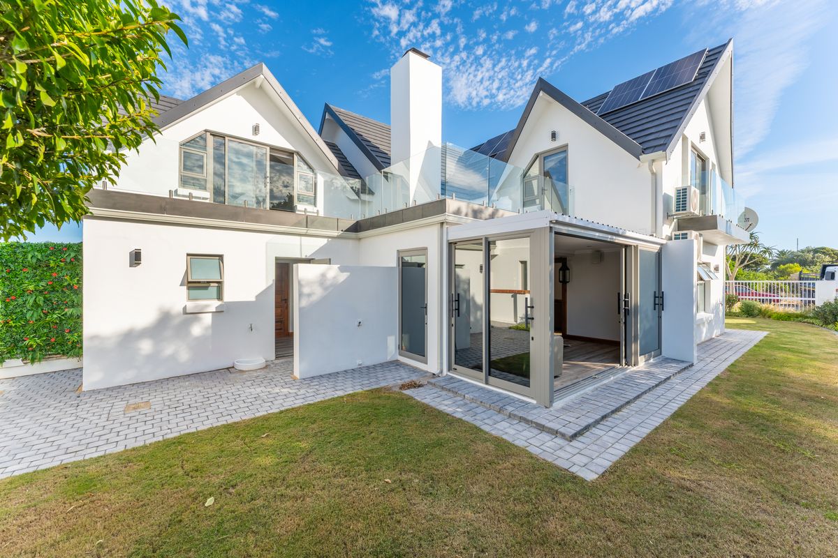 Immaculate Fully Furnished Coastal Home in an Exclusive Canal Area Location - Photo 5