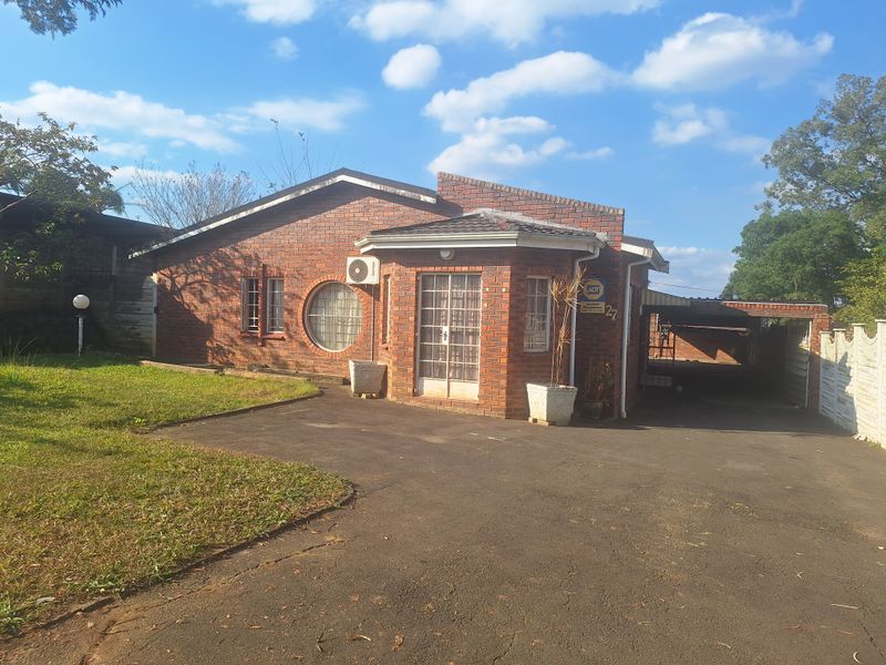 Comfortable Family Living in a Low-Maintenance Face Brick Home - Photo 1