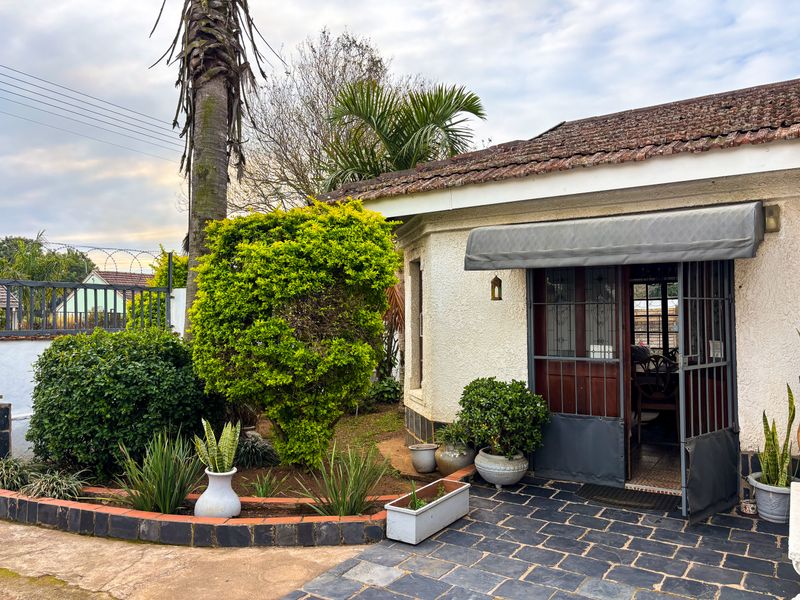 Neat Family Home with Flatlet, Workshop & Exceptional Versatility - Photo 1