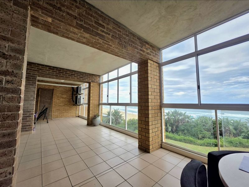 Wake Up to Breathtaking 180° Sea Views – Coastal Living at Its Finest!!!! - Photo 2