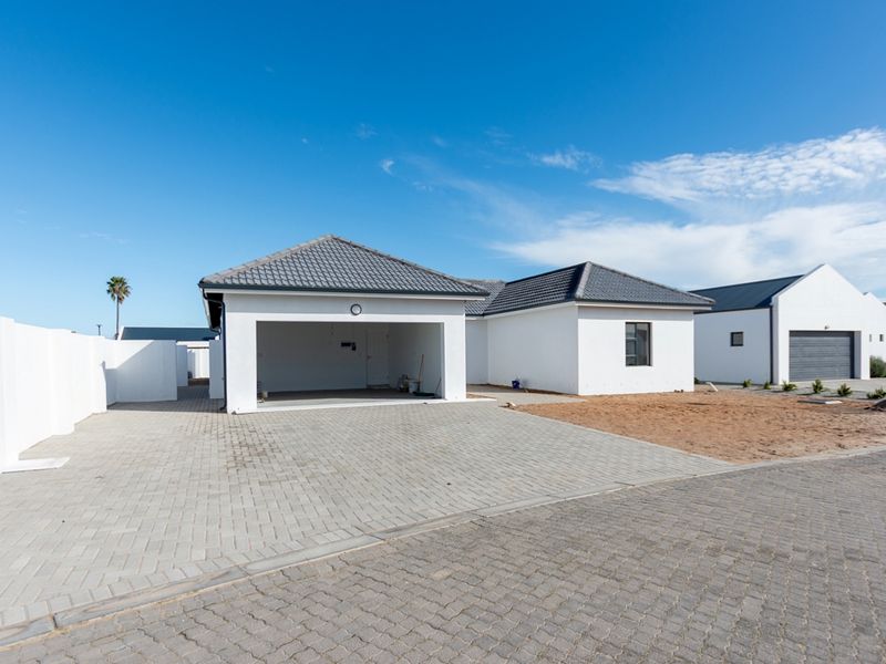 Stunning New Home – Almost Ready for Its Proud New Owners! - Photo 1