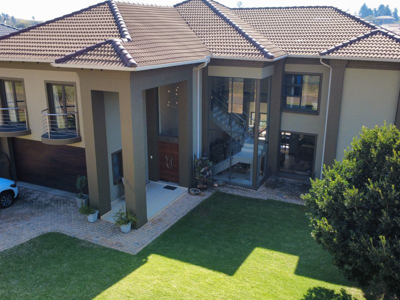 Prestigious Estate Living with Style, Space and Security - Photo 1