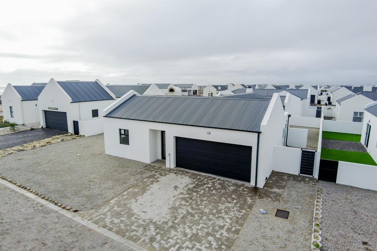 Sole Mandate Stylish Modern Coastal Home in a Secure West Coast Estate - Photo 2
