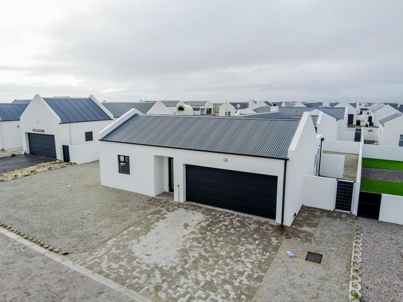Sole Mandate Stylish Modern Coastal Home in a Secure West Coast Estate - Photo 2