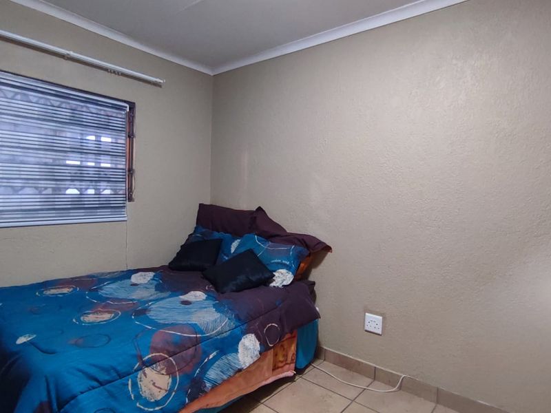 Neat & Secure Simplex in a Well-Maintained Complex - Photo 8