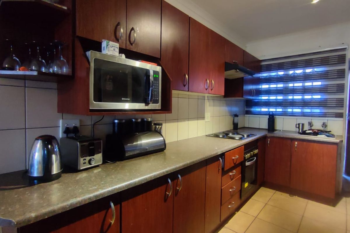 Neat & Secure Simplex in a Well-Maintained Complex - Photo 2