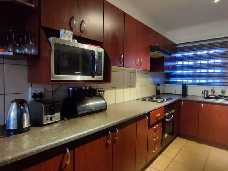 Neat & Secure Simplex in a Well-Maintained Complex - Photo 2