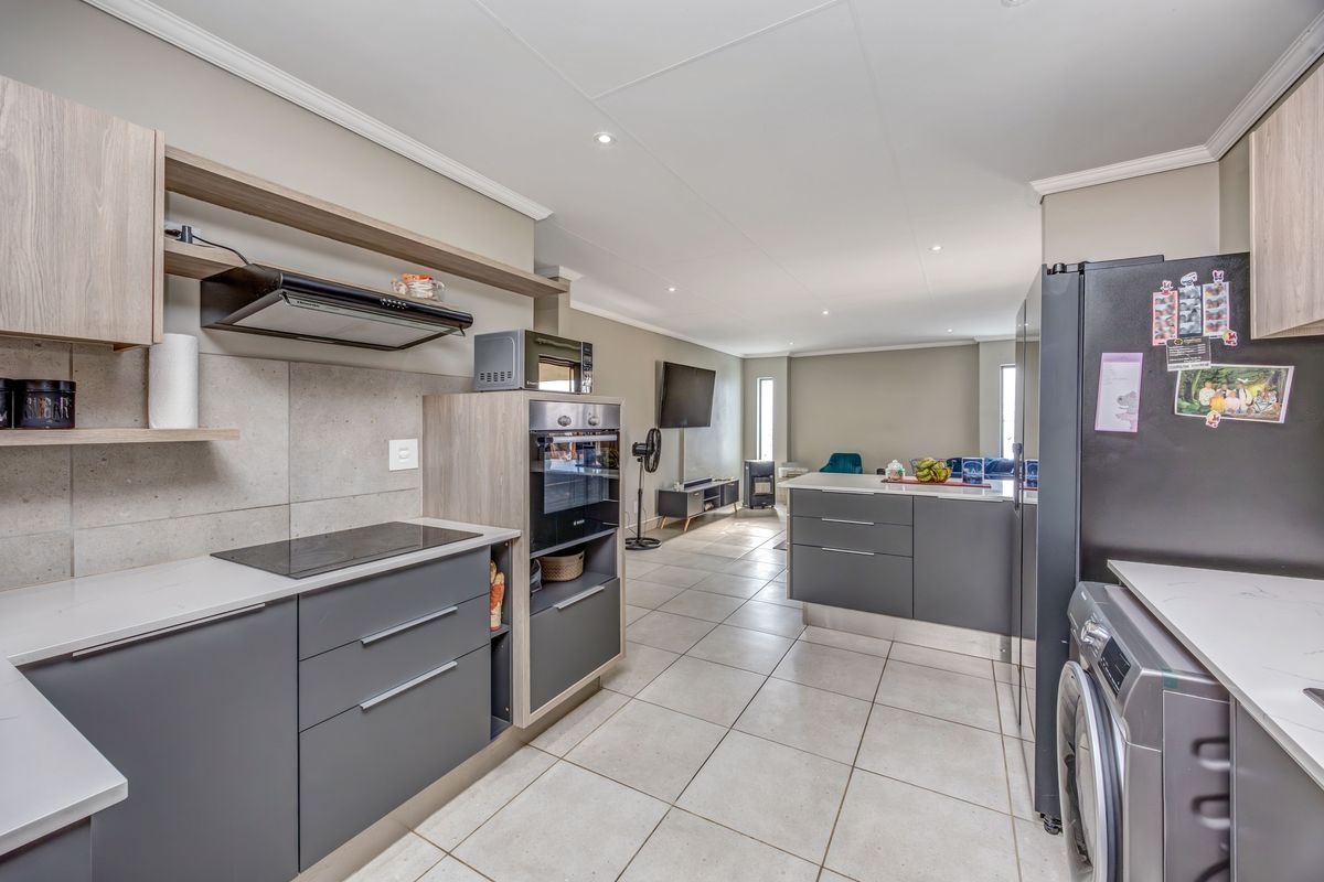 Discover Your Dream Home in Lion Pride Lifestyle Estate! Back-up power! - Photo 2