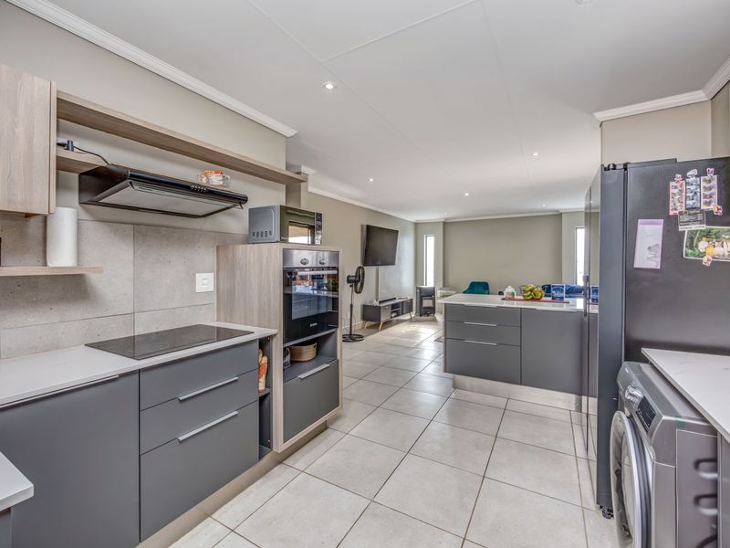 Discover Your Dream Home in Lion Pride Lifestyle Estate! Back-up power! - Photo 2
