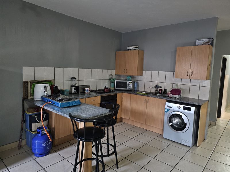 Enjoy comfortable living in a modern apartment located within a secured Estate - Photo 4