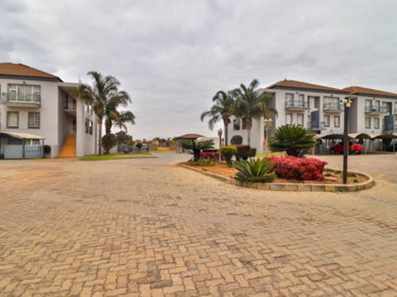 Enjoy comfortable living in a modern apartment located within a secured Estate - Photo 2