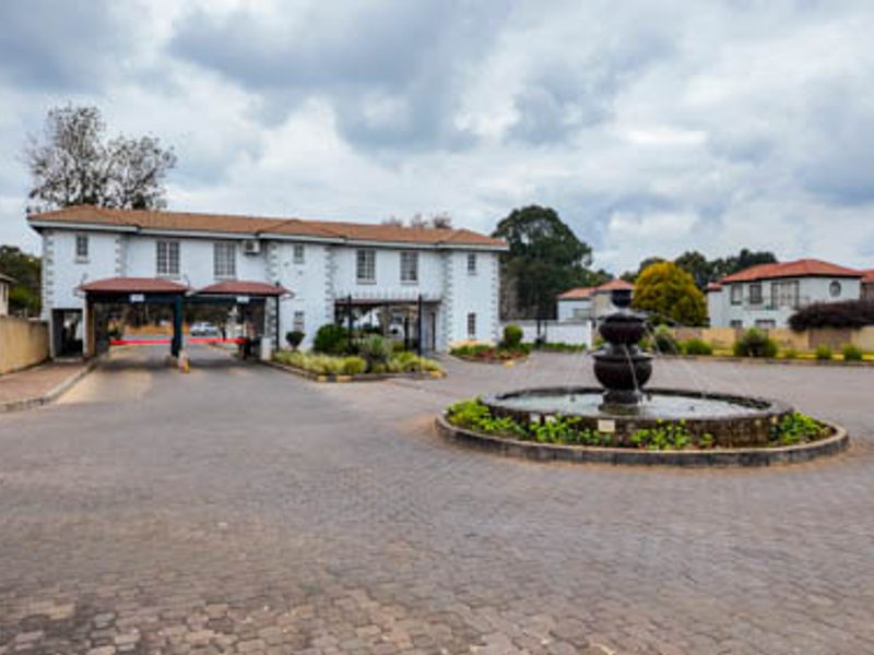 Enjoy comfortable living in a modern apartment located within a secured Estate - Photo 1