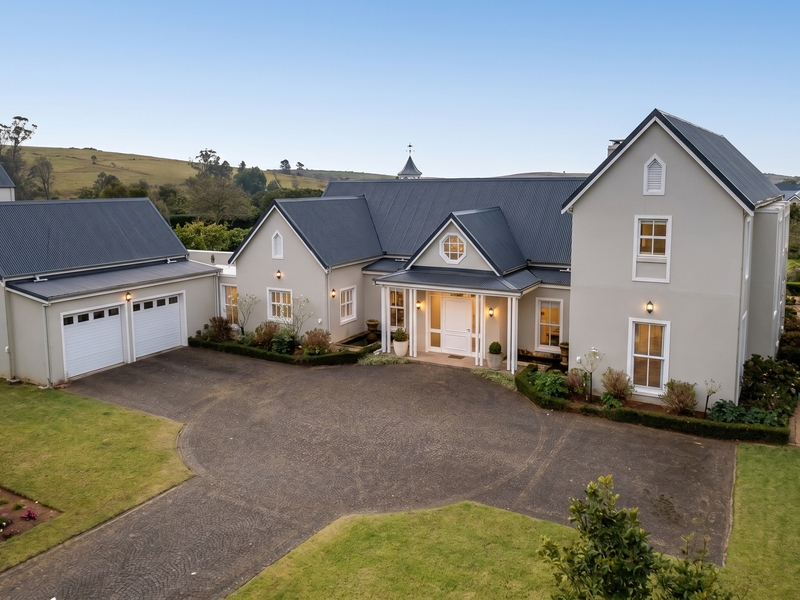 Elegant North Facing home with expansive garden and beautiful views in Garlington Estate - Photo 1
