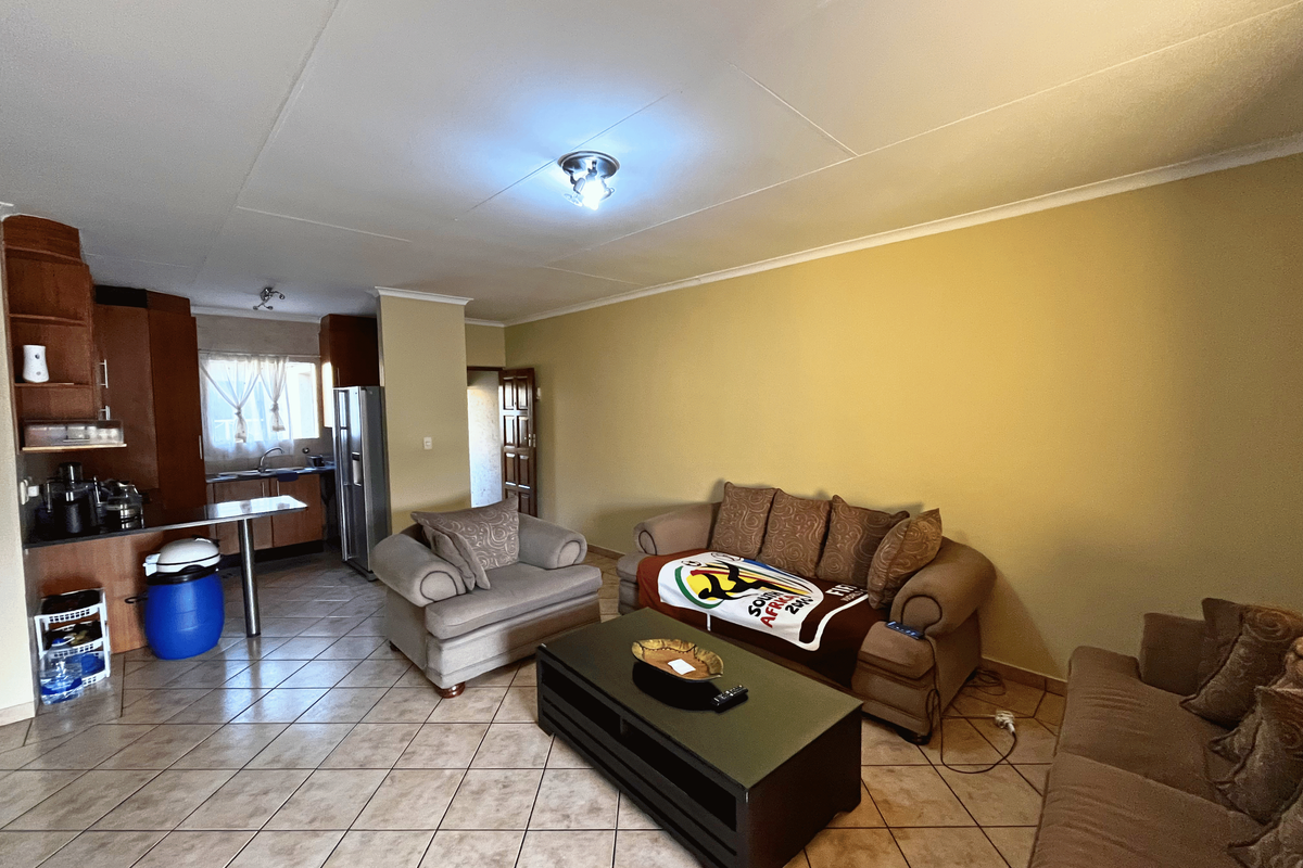 North-Facing 2-Bedroom Apartment with Private Braai & Borehole Water - Photo 5