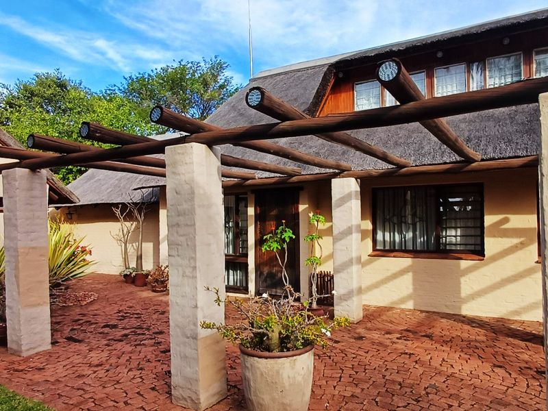 Spacious Double-Storey Thatch-Roof Home in Bela-Bela - Photo 1