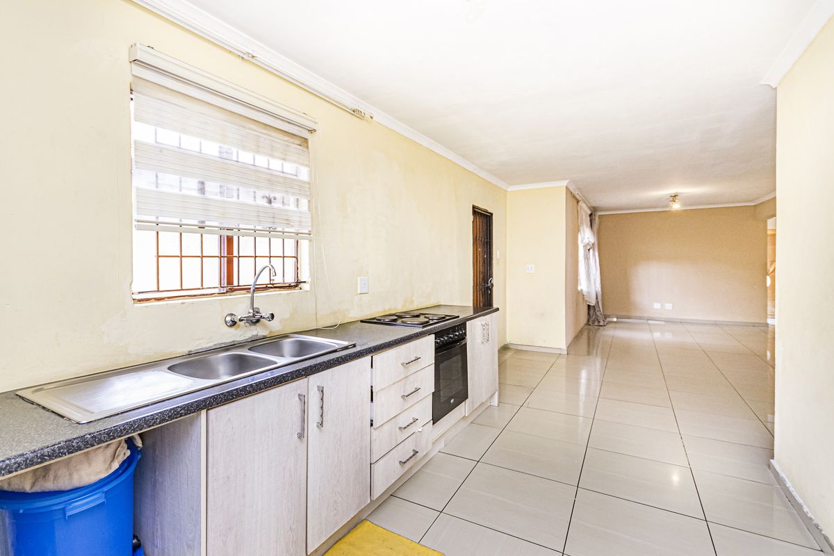 Spacious Family Home with Excellent Development Potential in a Prime Cosmo City Location- Ext 0 - Photo 2