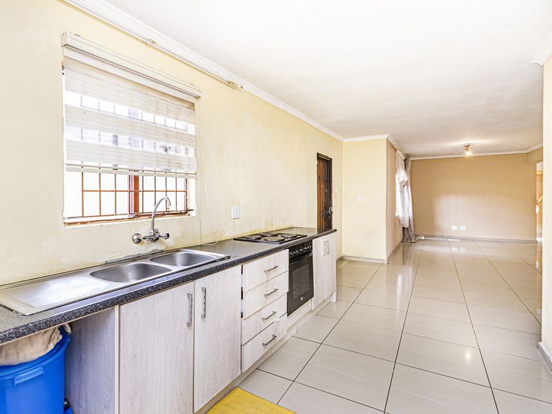 Spacious Family Home with Excellent Development Potential in a Prime Cosmo City Location- Ext 0 - Photo 2