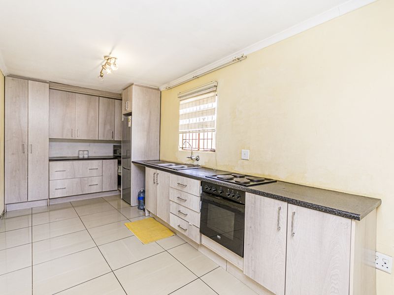 Spacious Family Home with Excellent Development Potential in a Prime Cosmo City Location- Ext 0 - Photo 10