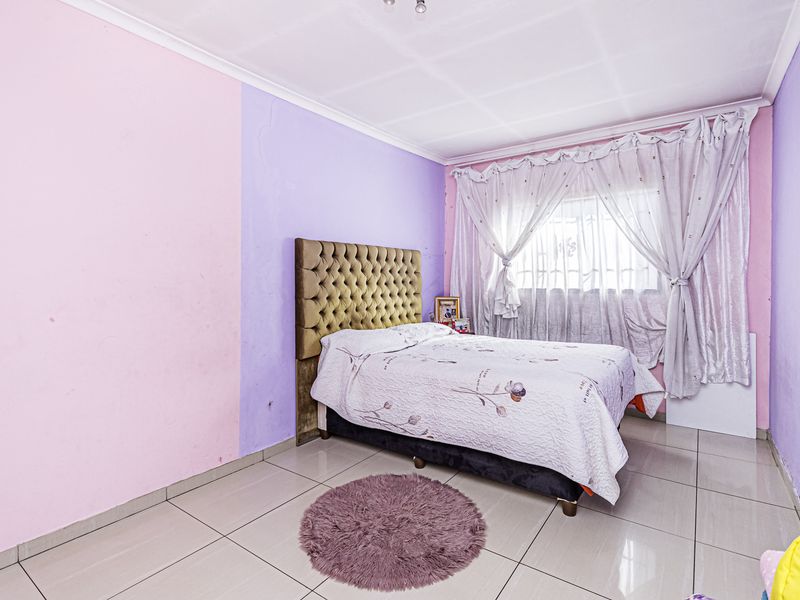 Spacious Family Home with Excellent Development Potential in a Prime Cosmo City Location- Ext 0 - Photo 6