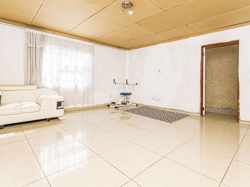 Spacious Family Home with Excellent Development Potential in a Prime Cosmo City Location- Ext 0 - Photo 7