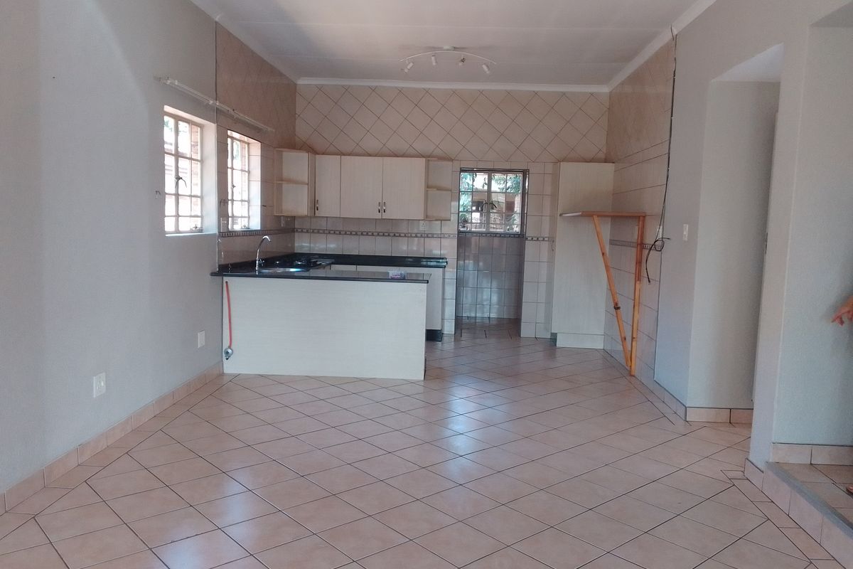 Modern, Stylish Lock-Up-and-Go Living in Prime Safari Gardens - Photo 3