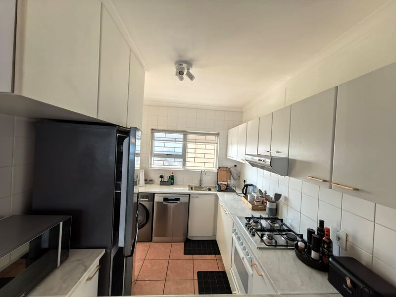 Strand Beachfront Living: 2 Bed, 2 Bath Fully Furnished, 6-Month Lease - Photo 7