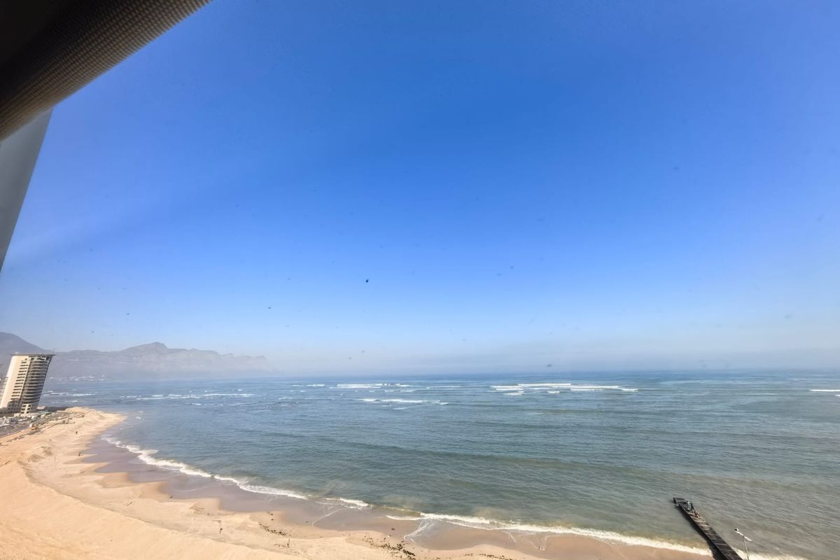 Strand Beachfront Living: 2 Bed, 2 Bath Fully Furnished, 6-Month Lease - Photo 2