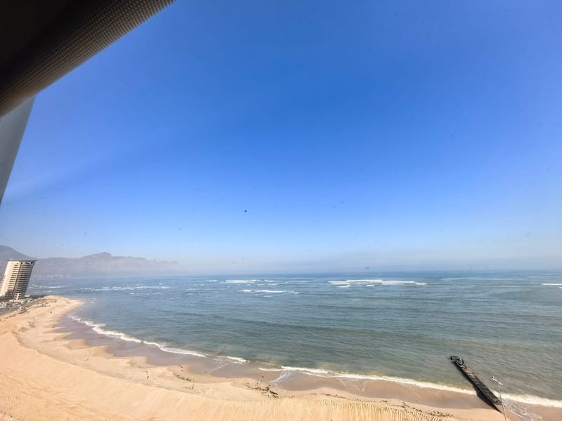 Strand Beachfront Living: 2 Bed, 2 Bath Fully Furnished, 6-Month Lease - Photo 2