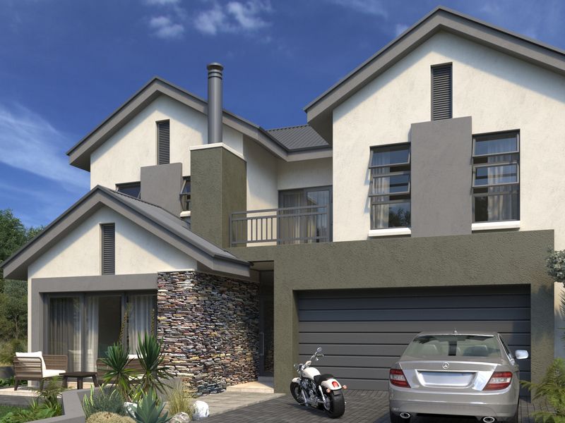 Modern double-story residential facade featuring stone cladding, a balcony, and an integrated double garage.