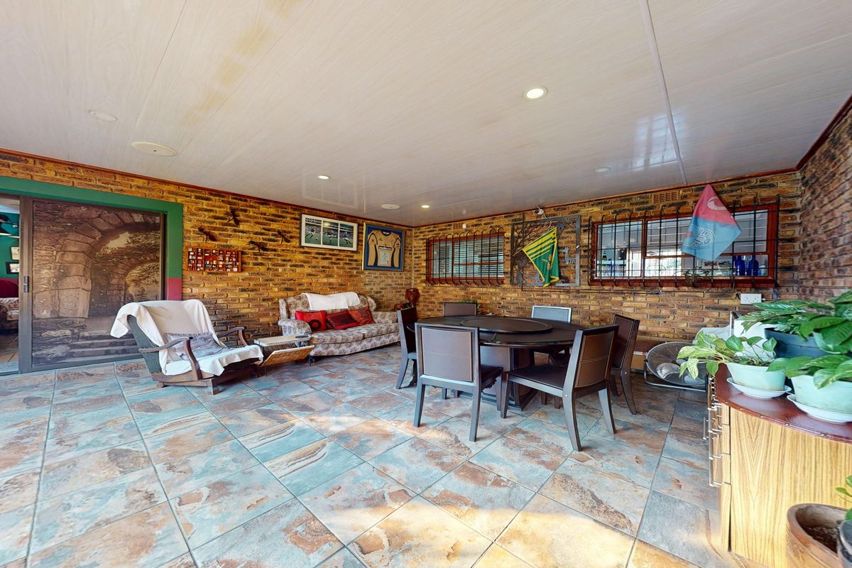 Immaculate Family Home with Flatlet & Solar in an Exclusive Enclosed Area of Sunward Park - Photo 2