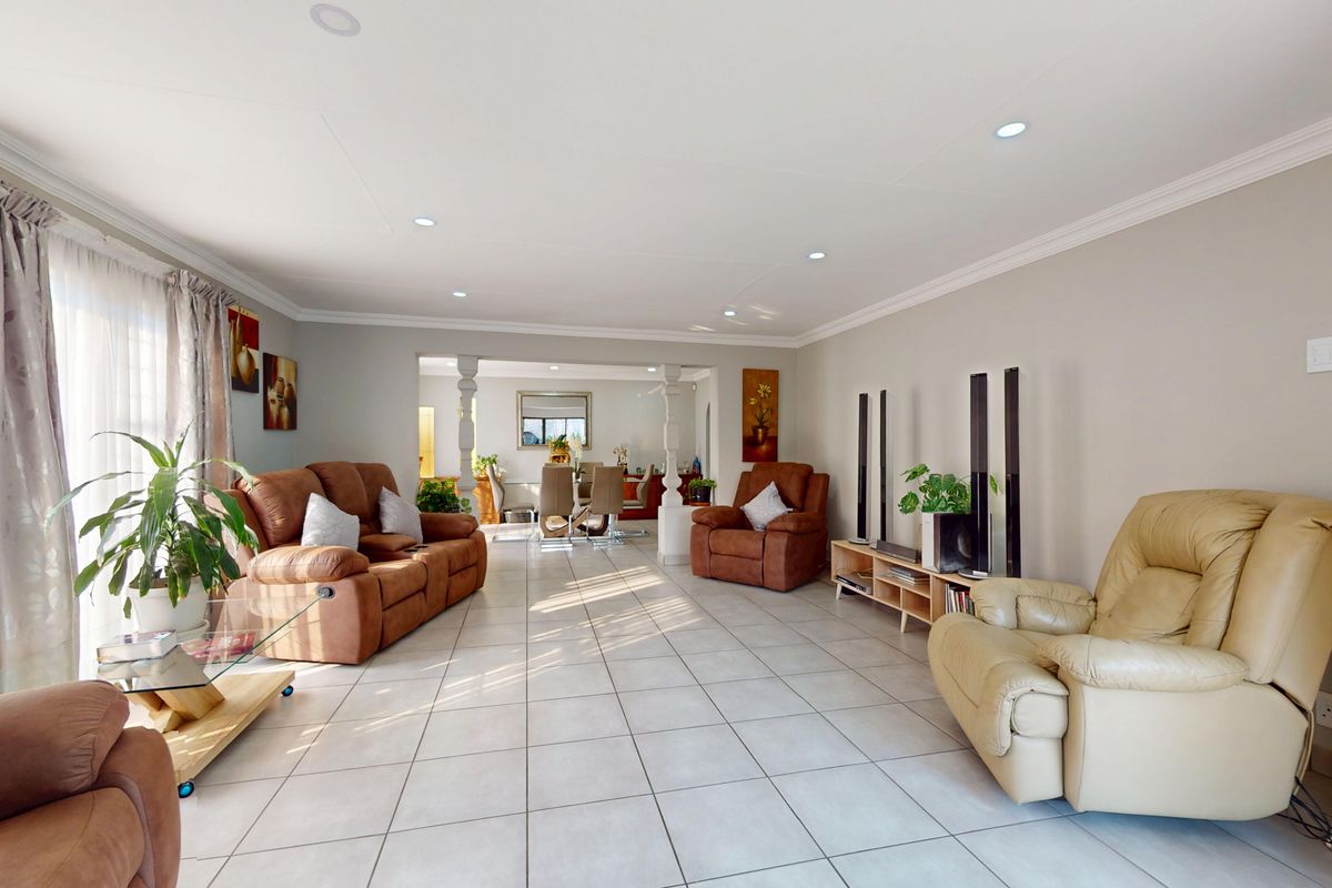 Immaculate Family Home with Flatlet & Solar in an Exclusive Enclosed Area of Sunward Park - Photo 3