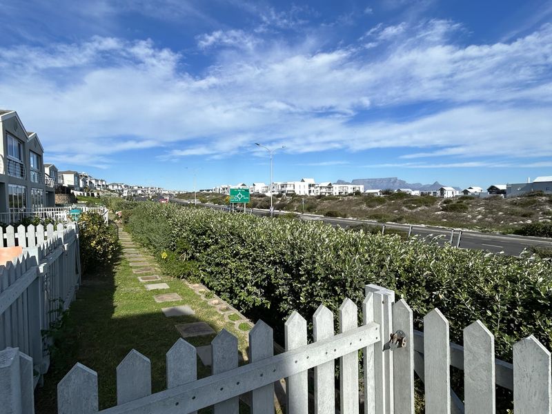 Fully Furnished 2-Bed Duplex with Ocean Views | Secure Big Bay Estate - Photo 1