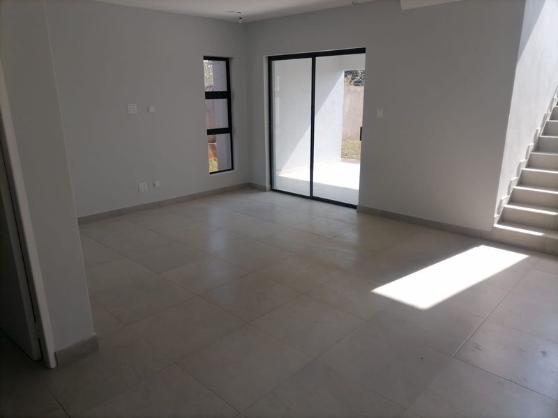 THREE BEDROOM TWO BATHROOM AND DOUBLE GARAGE IN DU VIN ESTATE RASLOUW(CENTURION) - Photo 9