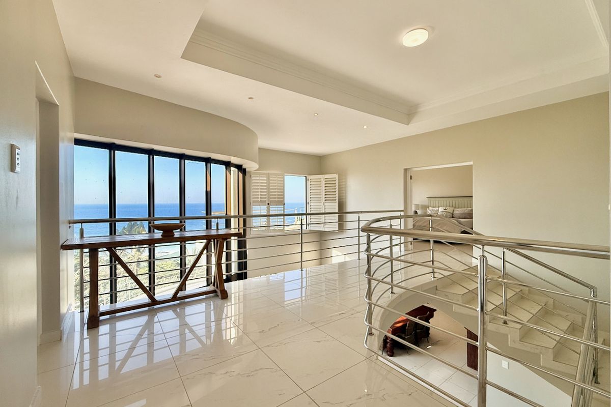 Luxury Coastal Living with Panoramic Ocean Views and Guesthouse rights - Photo 3