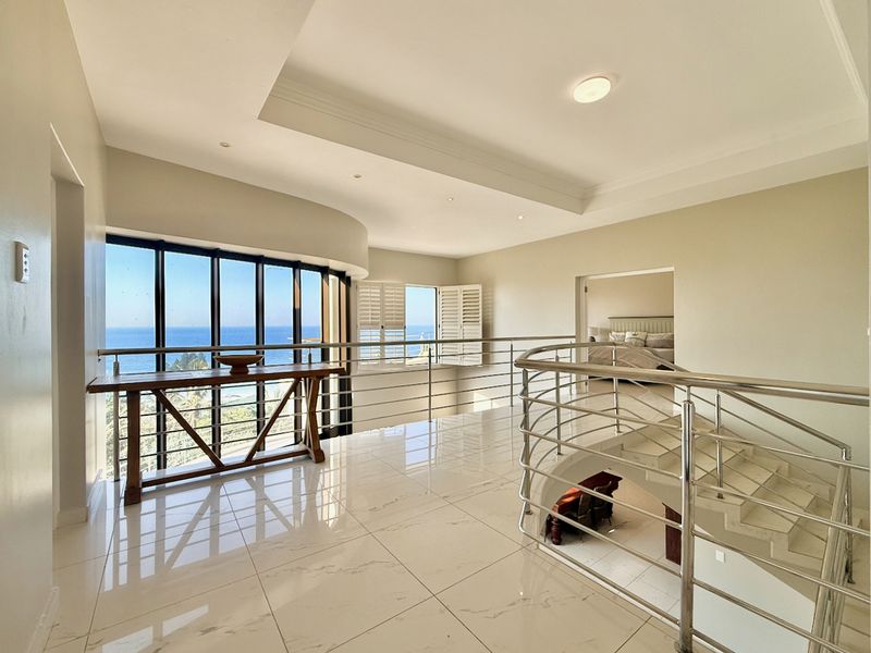 Luxury Coastal Living with Panoramic Ocean Views and Guesthouse rights - Photo 3