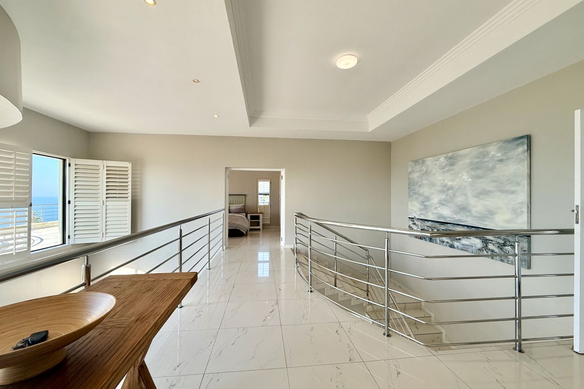 Luxury Coastal Living with Panoramic Ocean Views and Guesthouse rights - Photo 4