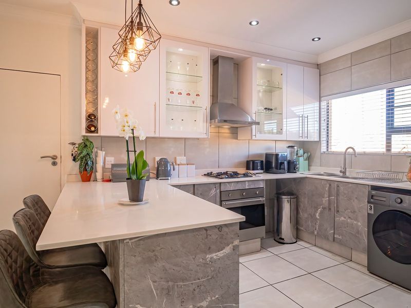 Elegant Solar-Powered 3-Bedroom Cluster in Exclusive Helderwyk Estate