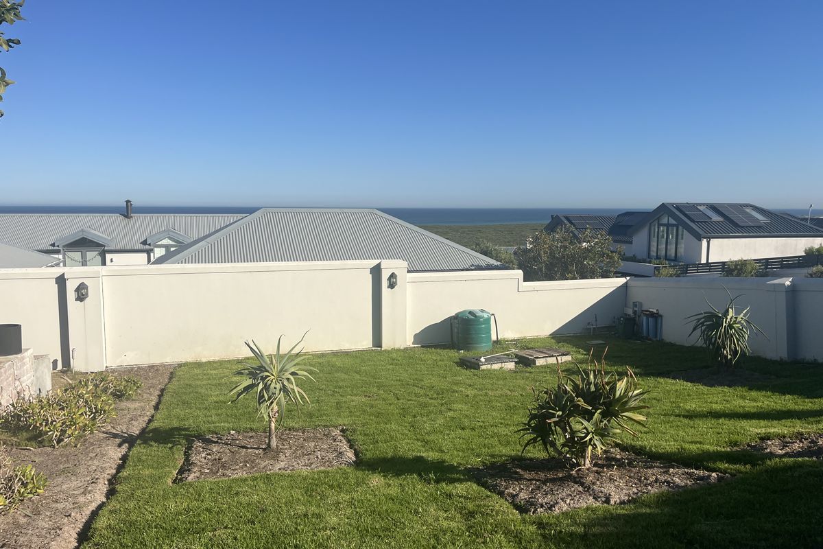 Elevated Family Home with Spectacular Ocean & Fynbos Views in Atlantic Beach Golf Estate - Photo 3