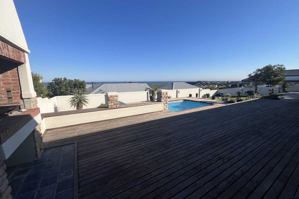 Elevated Family Home with Spectacular Ocean & Fynbos Views in Atlantic Beach Golf Estate - Photo 2