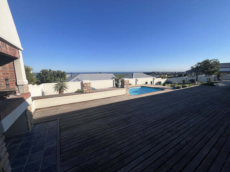 Elevated Family Home with Spectacular Ocean & Fynbos Views in Atlantic Beach Golf Estate - Photo 2