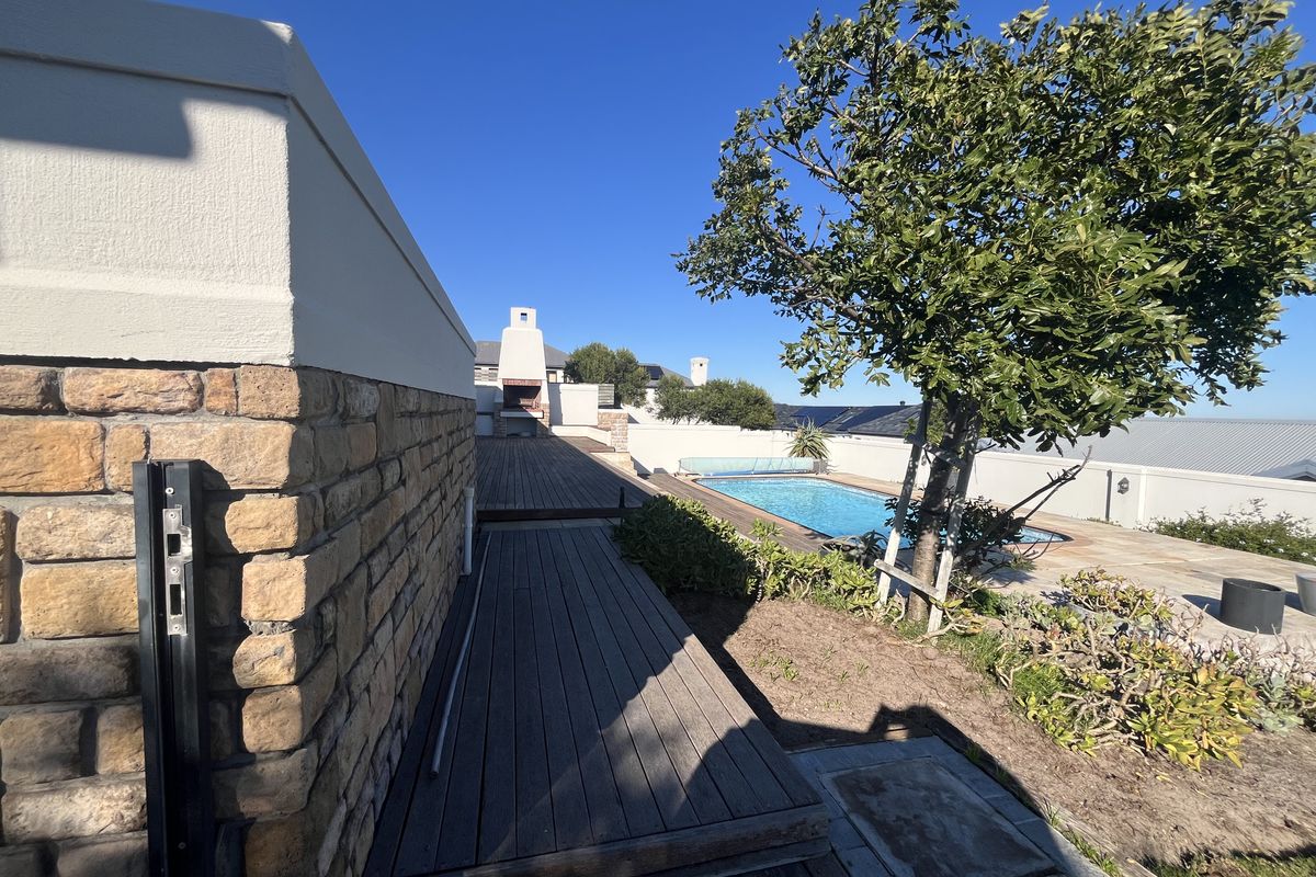 Elevated Family Home with Spectacular Ocean & Fynbos Views in Atlantic Beach Golf Estate - Photo 5