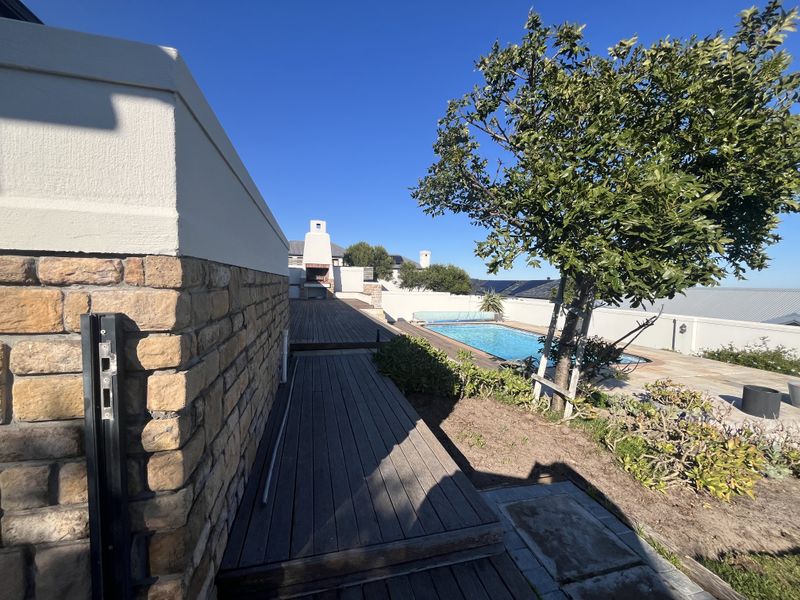Elevated Family Home with Spectacular Ocean & Fynbos Views in Atlantic Beach Golf Estate - Photo 5