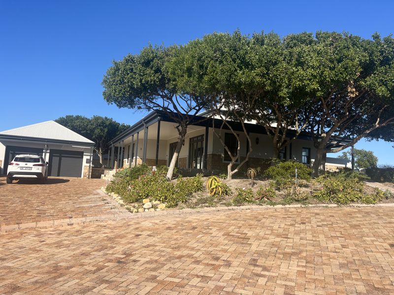 Elevated Family Home with Spectacular Ocean & Fynbos Views in Atlantic Beach Golf Estate - Photo 9