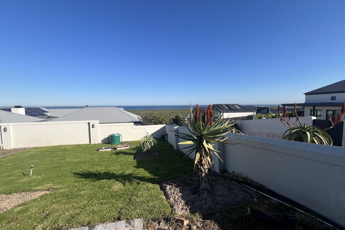 Elevated Family Home with Spectacular Ocean & Fynbos Views in Atlantic Beach Golf Estate - Photo 4